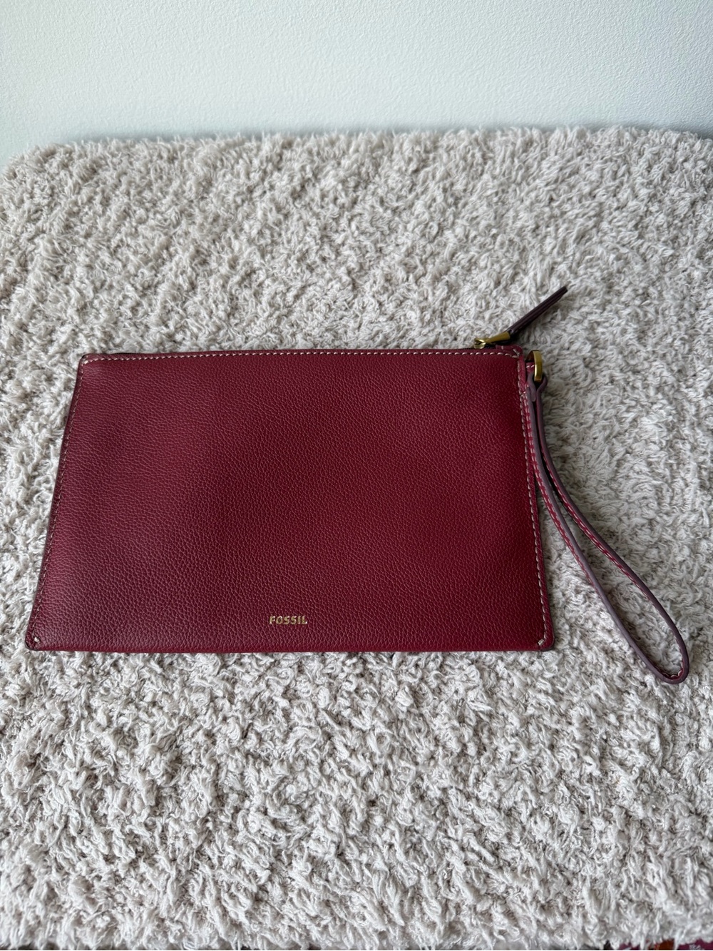 Fossil Pebbled Leather Wristlet in Burgundy with Gold Hardware